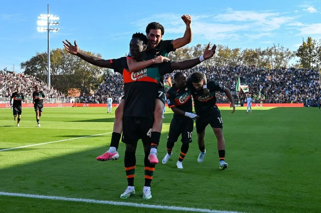 Venezia players celebrate against Napoli. Photo: Italpress