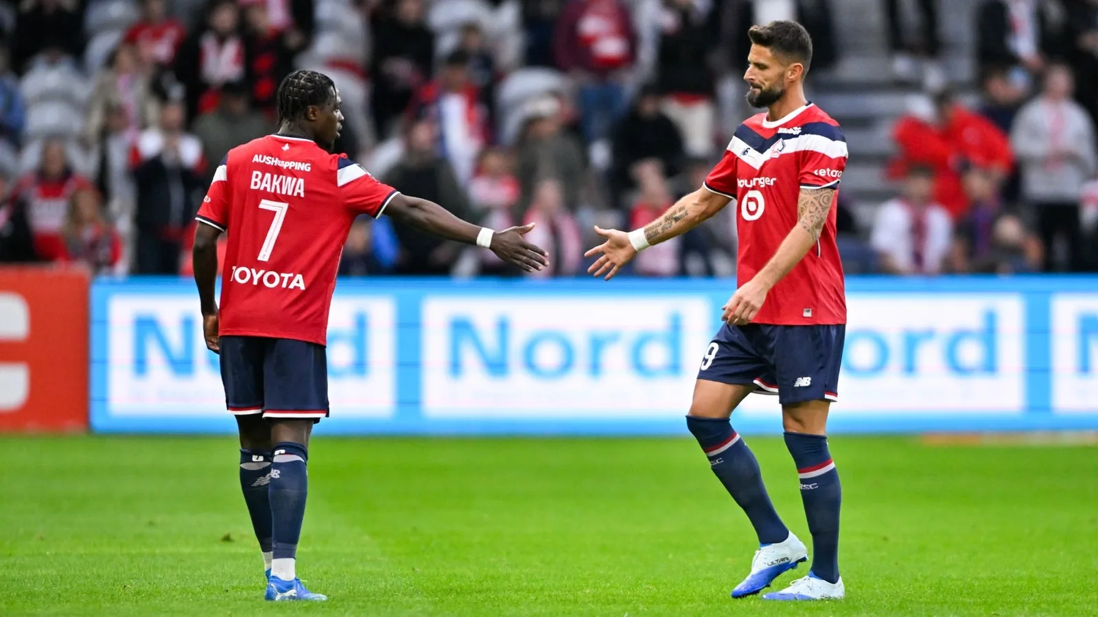 Lille's Bakwa and Olivier Giroud. Photo: BFMTV