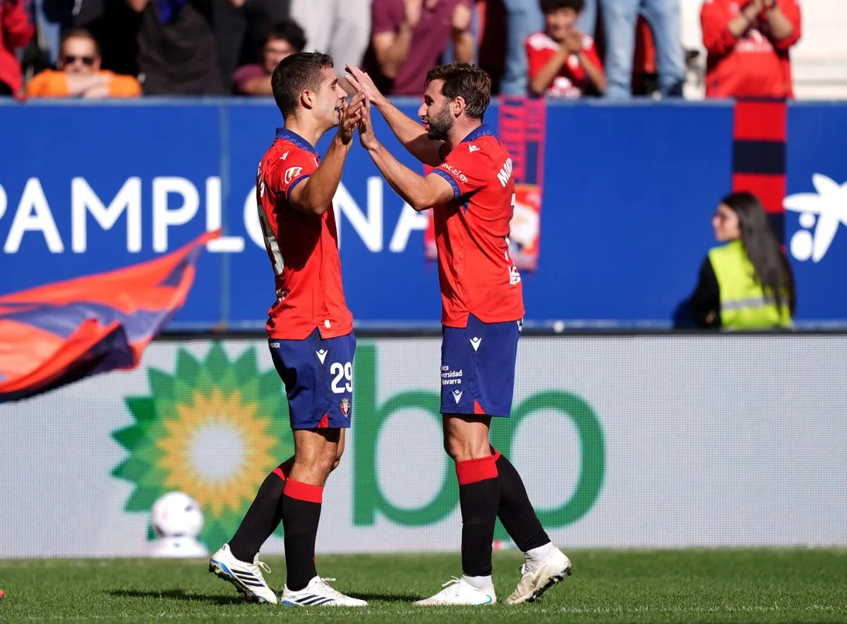 Osasuna players celebrate against Racing Santander. Photo: Eurosport