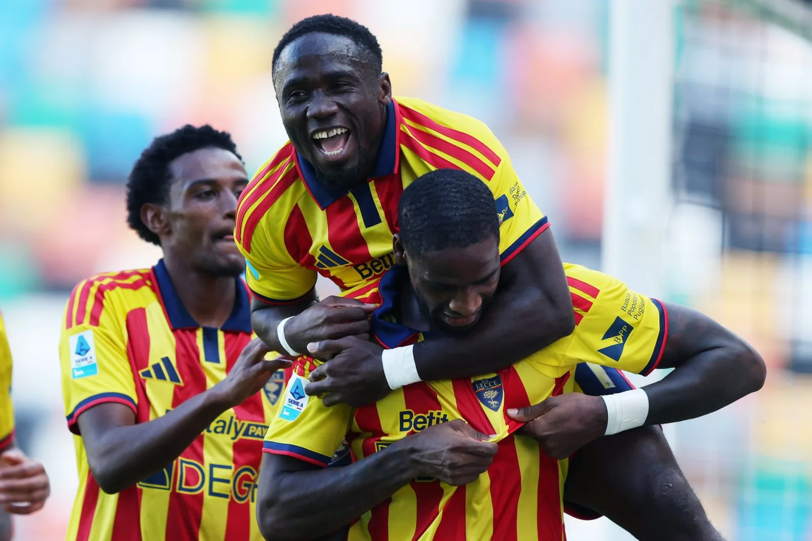 Lecce players celebrate at Udinese. Photo: Italpress / Image Sport